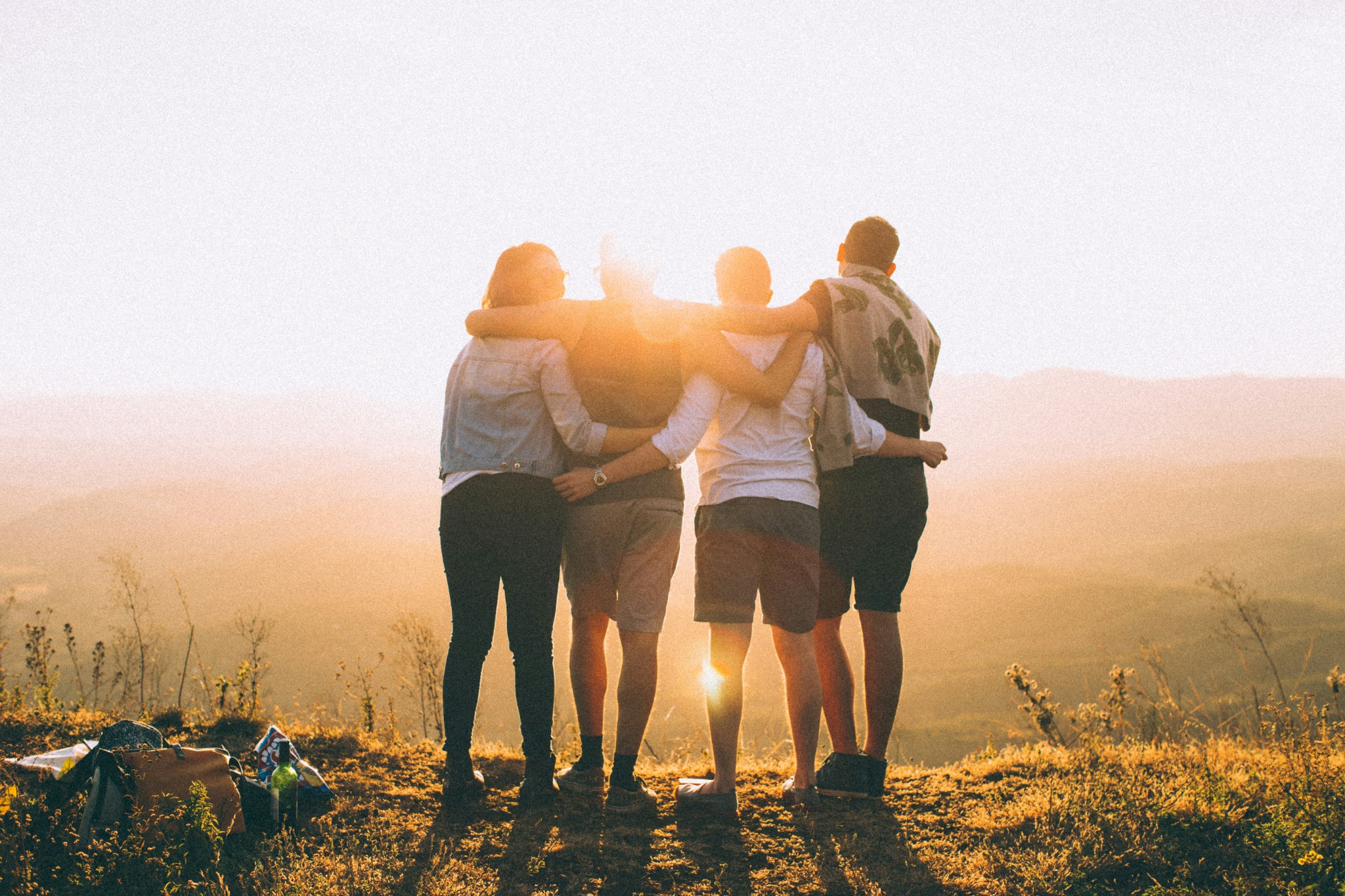 Group of friends smiling together and feeling at home